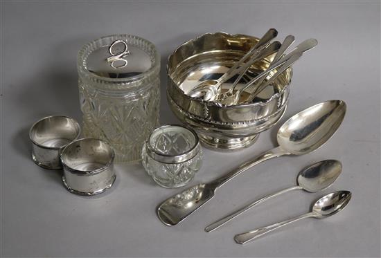 A group of small silver wares including rose bowl, flatware and napkin rings.